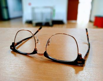 Close-up of eyeglasses on table
