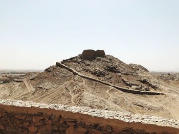 Rock formations in desert against clear sky