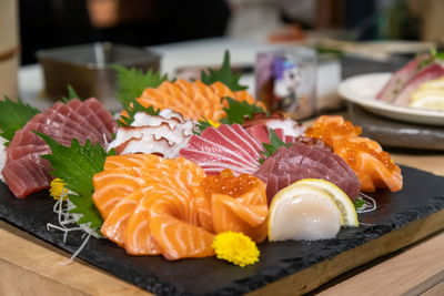 Close-up of sushi served on table