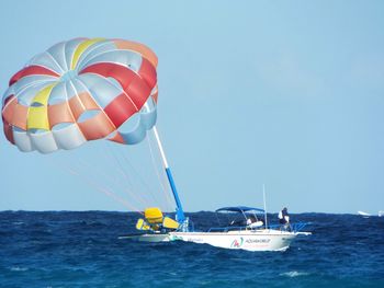 Boat in sea against sky