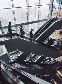 High angle view of people on staircase in city