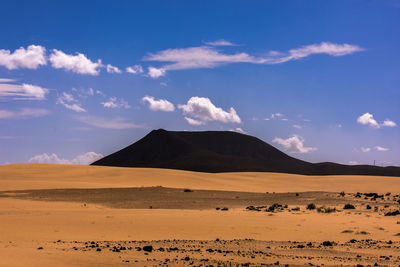 Scenic view of desert against sky