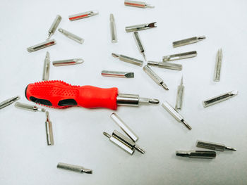 High angle view of objects on table against white background