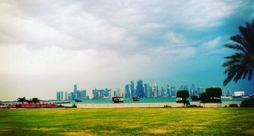 View of city against cloudy sky