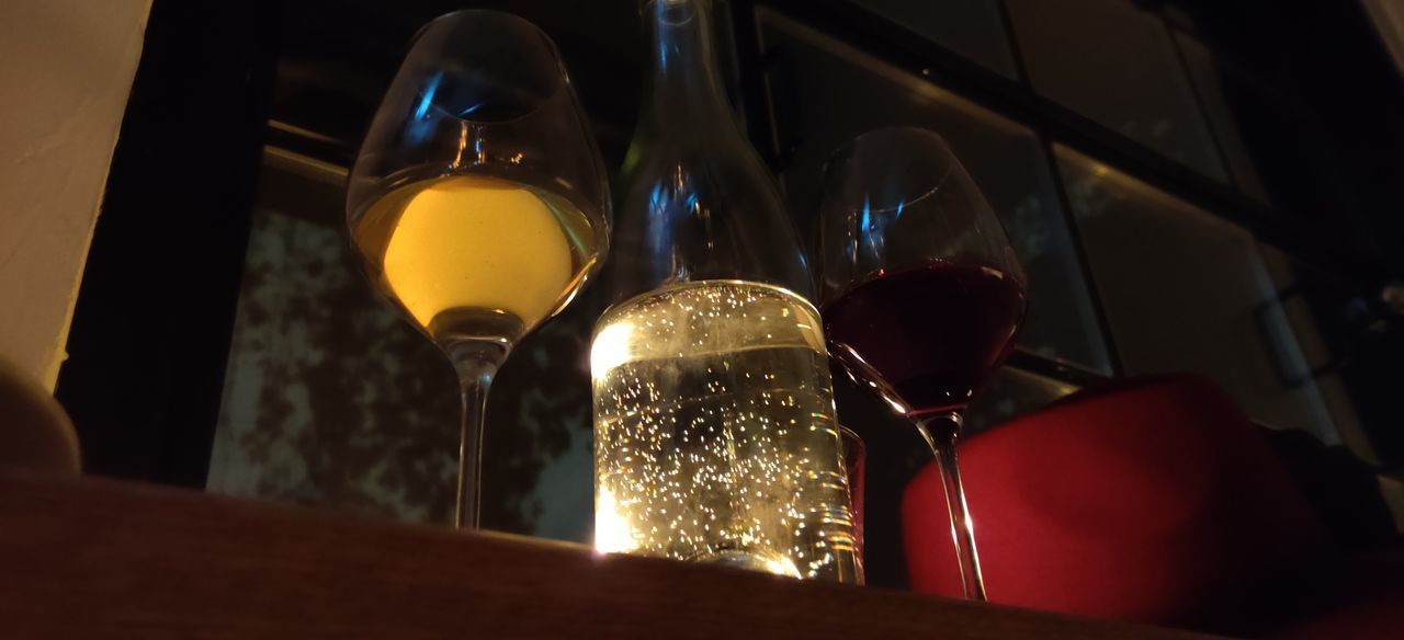 LOW ANGLE VIEW OF BEER GLASS ON TABLE IN RESTAURANT