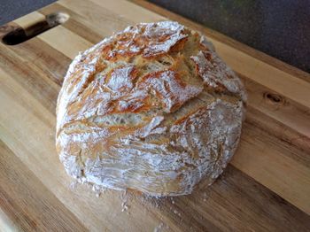 High angle view of bread on cutting board