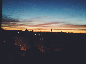 Silhouette of buildings at sunset