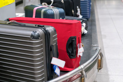 Close-up of luggage on conveyor belt in airport