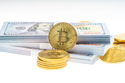 Close-up of coins on white background