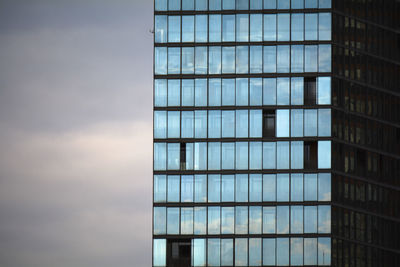 Low angle view of modern building against sky