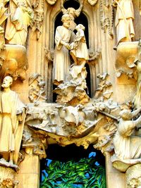 Low angle view of statue against building