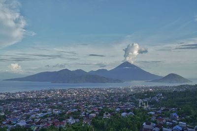 Panoramic view of volcanic landscape against sky