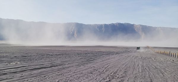 Panaromic view of sandstorm arround bromo mountain in the morning