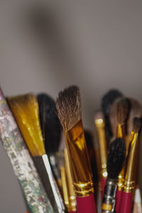 Close-up of paintbrushes in kitchen