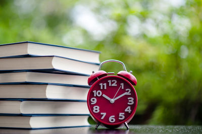 Close-up of clock on table