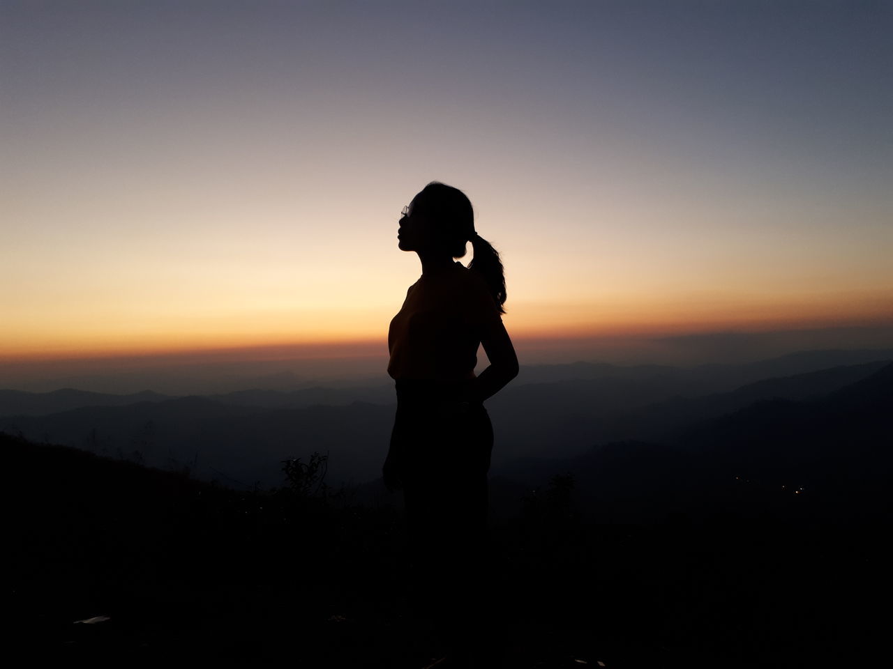 silhouette, sky, sunset, standing, real people, beauty in nature, scenics - nature, lifestyles, tranquil scene, tranquility, orange color, leisure activity, people, nature, women, side view, adult, idyllic, copy space