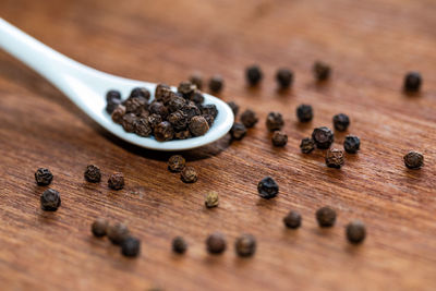 Close-up of coffee beans on table