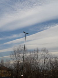 Low angle view of street light against sky