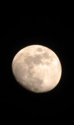 Close-up of moon against clear sky at night