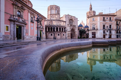 Reflection of buildings in water. valencia, spain