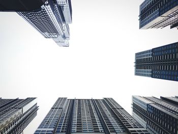 Low angle view of modern buildings against clear sky