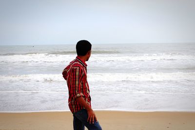 People standing on beach