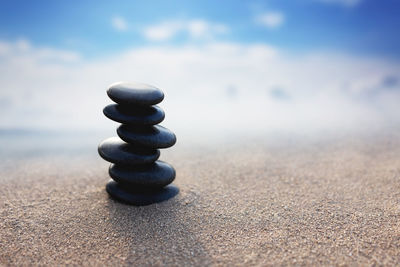 Stack of stones on sand