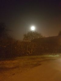 Scenic view of moon against clear sky at night