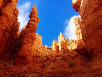 Low angle view of rock formations against blue sky at bryce canyon national park