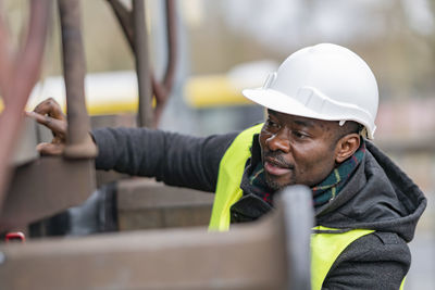 Engineer repairing train