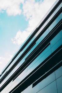 Low angle view of modern building against sky