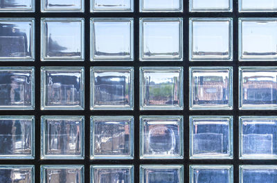 Looking through a facade made of translucent, or semi-transparent glass blocks