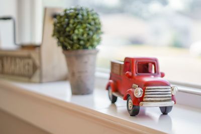 Close-up of toy car on table at home