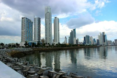 View of city against cloudy sky