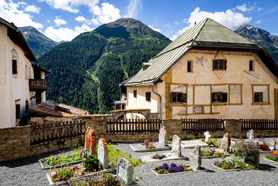 Houses and buildings against sky