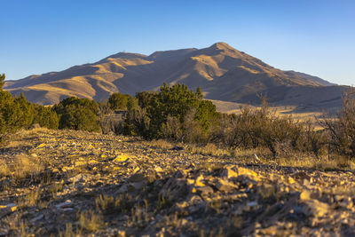 Scenic view of mountains against clear sky