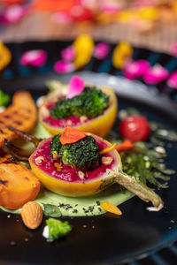 Close-up of fruits in plate on table