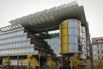 Low angle view of modern building against sky