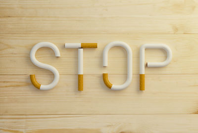 High angle view of text on wooden table