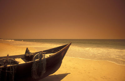 Scenic view of sea against clear sky during sunset