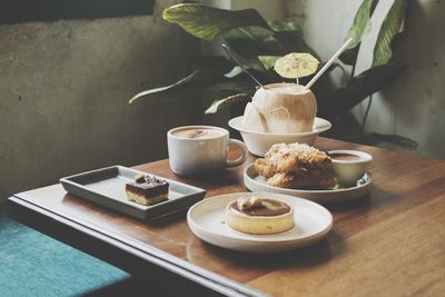 Dessert with coconut drink and chocolate cake