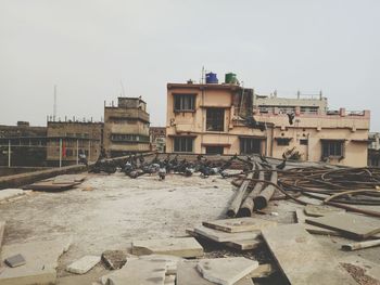 View of buildings in city against clear sky