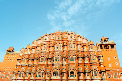 Low angle view of building against blue sky