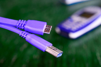 Close-up of purple usb cable