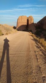 Shadow of man on desert