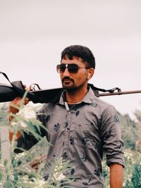 Young man with gun.