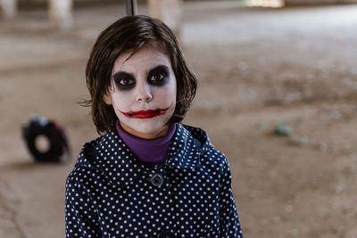 Portrait of woman standing outdoors