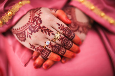 Henna is traditional malay decorative art. close-up.