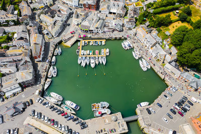 High angle view of boats moored at harbor