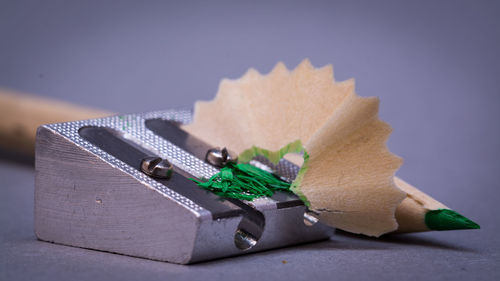 Close-up of sharpener on gray background